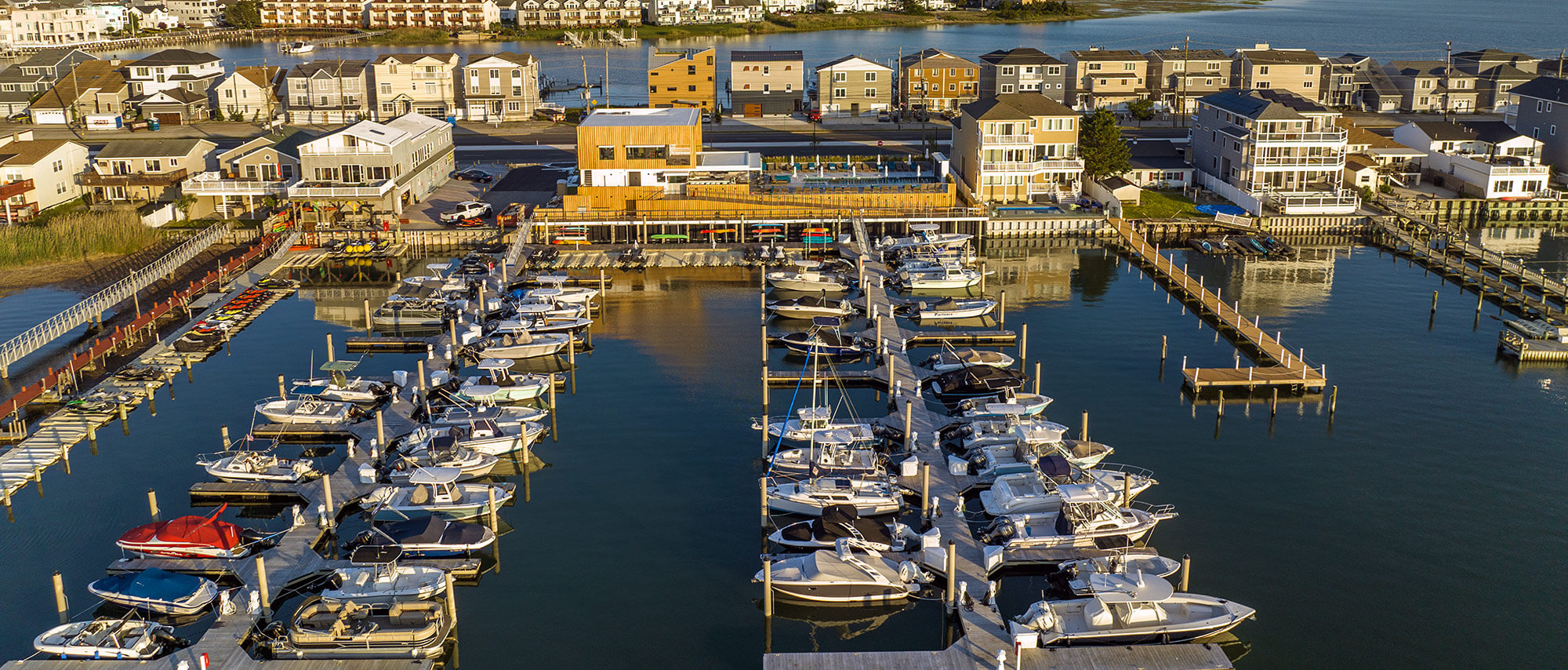 Aerial view looking over the docks of Brigantine Marina and Paddle Club